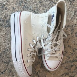 Converse White High-Top Sneakers with Star Stitching and Red/Blue Stripe